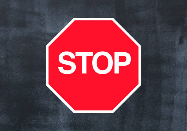 istock Red Warning stop Sign Black Background Chalkboard Style 1430956986