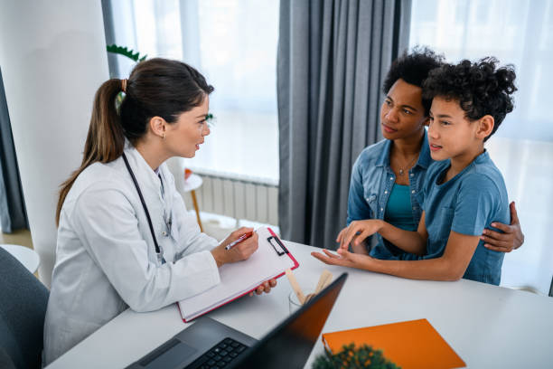 istock Black boy having a medical exam at doctor's office 1430958288