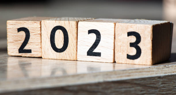 istock 2023 year text made of wooden blocks 1430960993