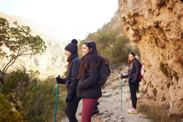 istock Friends hike in the mountains on a weekend. 1430966706