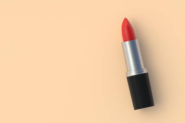 istock Sexy red lipstick. Cosmetic accessories. Make-up tools. Top view. Copy space. 3d render 1430967201