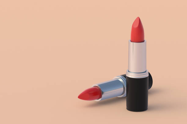 istock Luxury lipsticks on beige background. Cosmetic accessories. Make-up tools. Copy space. 3d render 1430967291