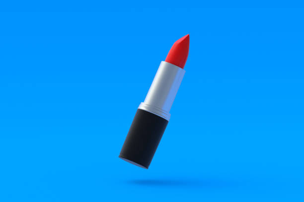 istock Levitating luxury lipstick on blue background. Cosmetic accessories. Make-up tools. 3d render 1430967293