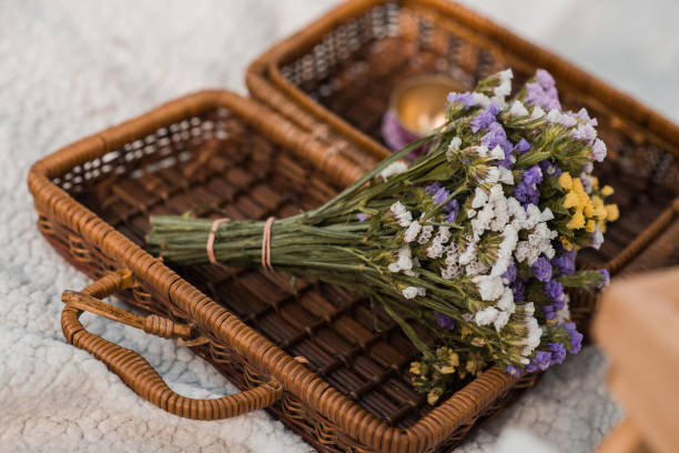 istock Wild flower bouquet in a retro picnic basket 1430967690