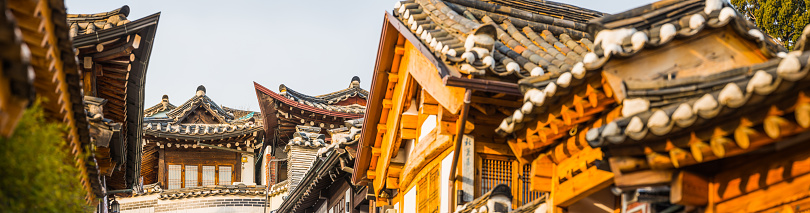 Traditional wooden framed houses along a pretty lane in the Bukchon Hanok village in Seoul, South Korea’s vibrant capital city.