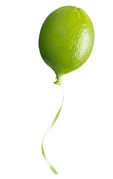 Green lime balloon concept on white