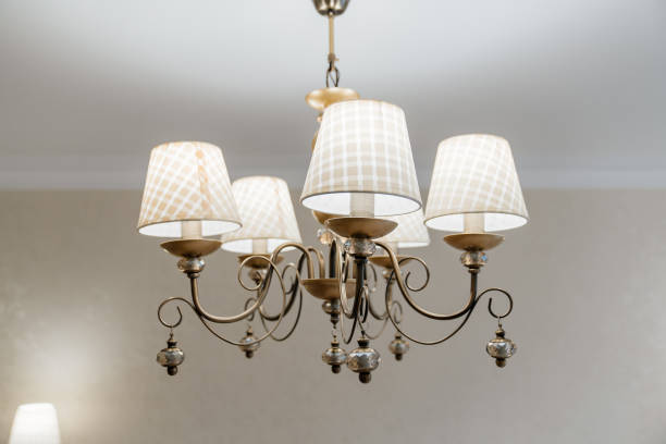 istock classic ceiling lamp with white lampshades. lighting fixtures. 1430977561