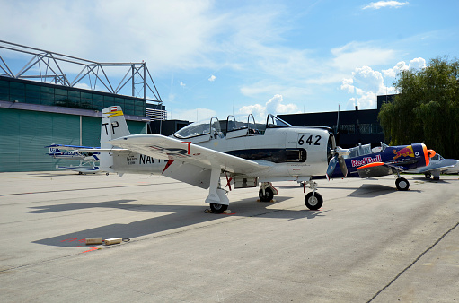 Zeltweg, Austria - September 03, 2022: Public airshow in Styria named Airpower 22, North American T28B Trojan and North American T-6 Harvard behind, a former WWII fighter aircraft,