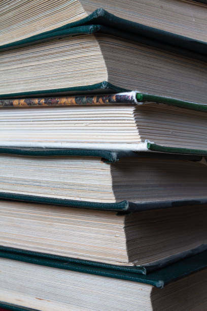 istock pile of thick books 1430982019