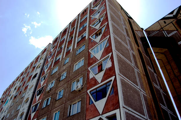 Almaty with a panel building realised in the former soviet union. In Almaty where realized many thousends of panel buildings with three till 12 storeys. The image was captured during summer season.
