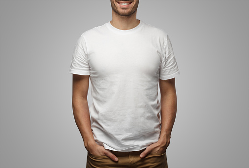 White t-shirt on a wooden surface