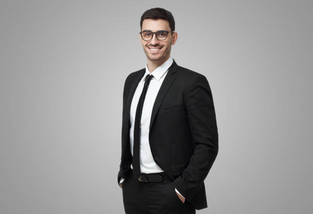 istock Business man in glasses looking at camera, showing confidence and providing stability for employees 1430988990