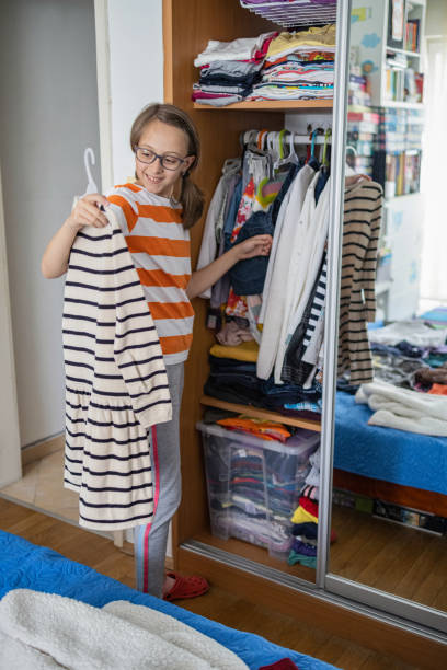 istock Girl getting dressed up for school 1430989574