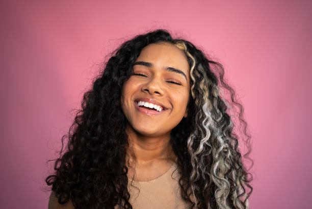 istock Young woman on a pink background 1430989993