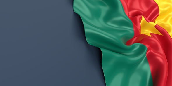 Partial Cameroon flag is waving on blue gray background. Horizontal composition with copy space. Easy to crop for all your social media and print sizes.