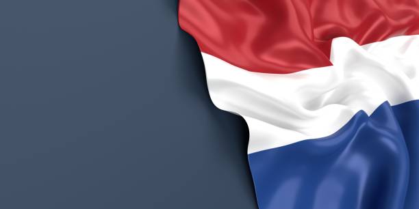 istock Dutch Flag is Waving Against Blue Gray Surface 1430990662