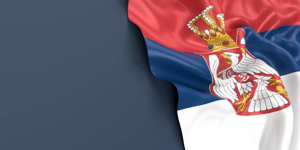 serbian flag is waving against blue gray surface - bandeira da sérvia imagens e fotografias de stock