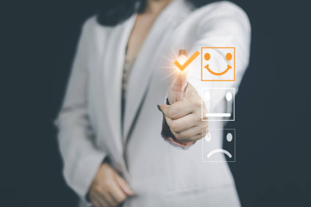 istock Customer service and Satisfaction concept women's hands doing online assessments in the satisfaction rating the popular service company allows customers in order to improve and develop the organization 1430996639