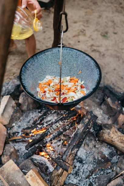 istock cooking food over a fire in a pot 1431001865