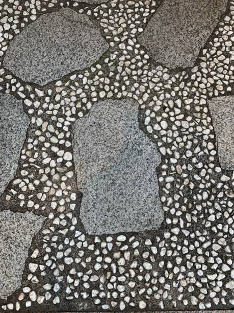 istock The background is a large stone slab surrounded by small pebbles. 1431002402