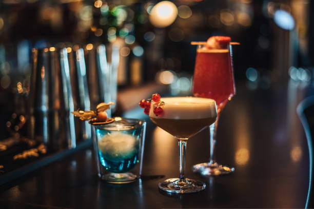 istock photo of three cocktails in a bar after a bartender prepared them 1431002558