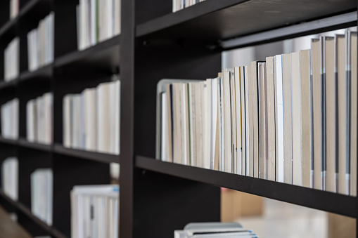 Close up of books on library shelves