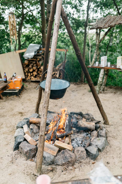 istock cooking food over a fire in a pot 1431007382