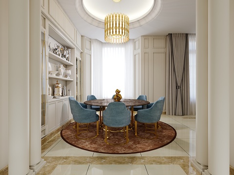 Dining room with brown round table and blue upholstered chairs and shelves with kitchen decor and brown carpet. 3D rendering.