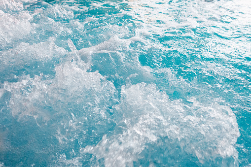 Blue bubbling water background