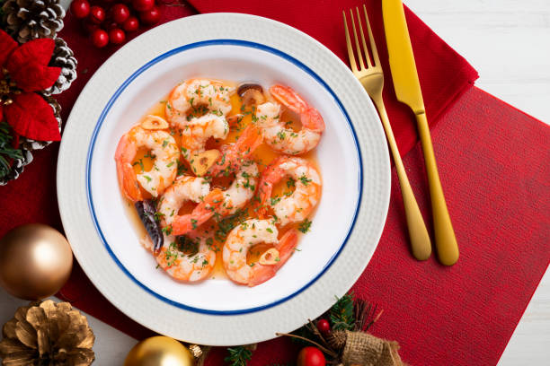 istock Garlic prawn tapas on a table with Christmas decorations. 1431011354