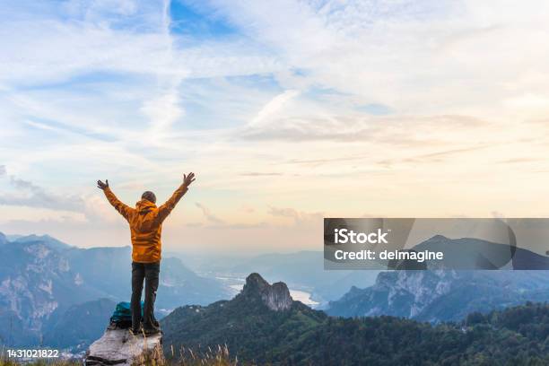 Happy Hiker With Raised Arms On Top Of The Mountain Stock Photo - Download Image Now