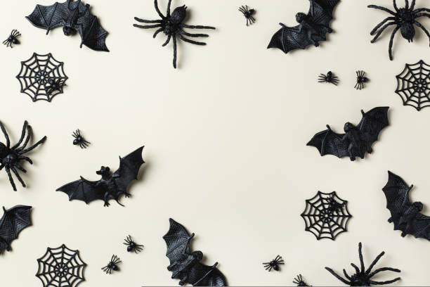 istock Halloween greeting card with bats, spiderweb and spider 1431033014