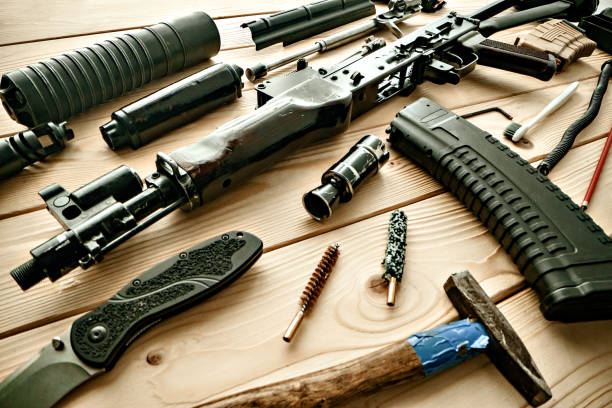 istock Gunsmith's working table for gun cleaning and maintaining 1431035476