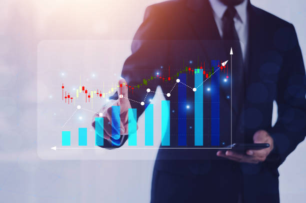 istock Office man finger touch virtual screen with stock market changes, business candlesticks graph chart. Double exposure of blue and white lines, growing numbers, online trading 1431042227