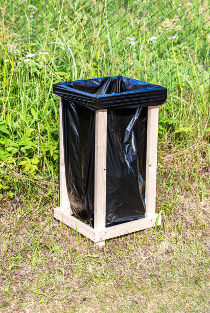 istock Garbage container for waste made of wooden slats and a plastic bag 1431044292