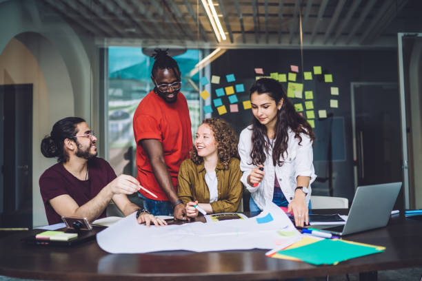 istock Young successful freelancers discussing business ideas 1431046485