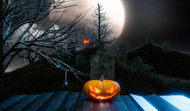 istock Halloween pumpkin in graveyard with full moon night 1431052464