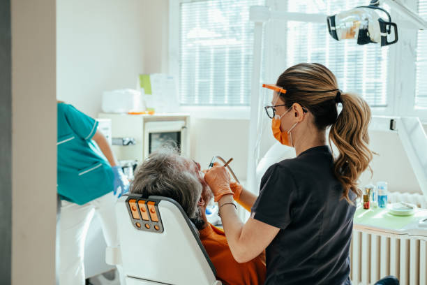 istock An Anonymous Mature Man Having a Dental Procedure at Dentist's Office 1431055987