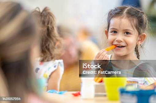 istock Daycare Children Eating Lunch 1431057054