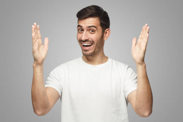istock Man showing big size gesture with hands, emphasizing great amount of something 1431059288