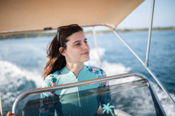 istock Female boat driver. 1431060560