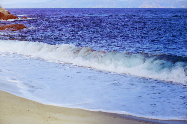 Beach in Greece, Halkidiki, sea coast at sunset