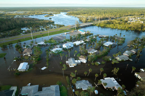 hurricane ian flooded houses in florida residential area. natural disaster and its consequences - ian stockfoto's en -beelden
