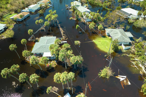 Hurricane Ian flooded houses in Florida residential area. Natural disaster and its consequences Hurricane Ian flooded houses in Florida residential area. Natural disaster and its consequences. hurricane ian stock pictures, royalty-free photos & images