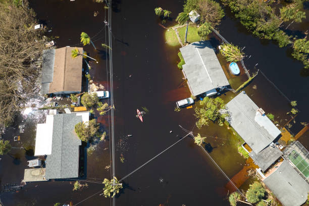 hurricane ian flooded houses in florida residential area. natural disaster and its consequences - flood hurricane road damaged imagens e fotografias de stock