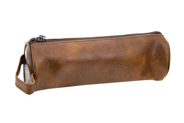 istock Long leather pencil pen case container isolated on the white background 1431079516