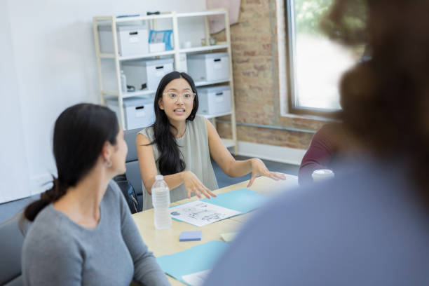 istock Staff members talk to unrecognizeable person 1431081316