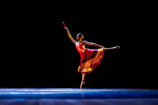 Black teenage girl dancing Don Quixote ballet, Act III Kitri Variation