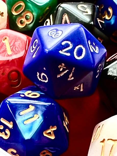 istock Role Playing dice with two blue D20s at the front 1431098781