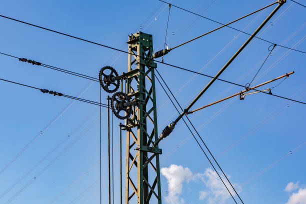 istock Several cables, wires and gears on a pole for overhead lines for railroads 1431101600
